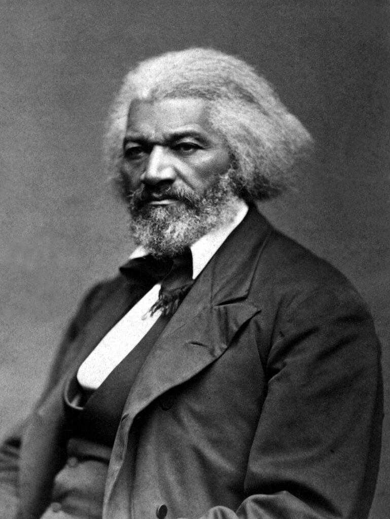 A photo of Frederick Douglass, a former enslaved person, abolitionist, and advocate for equality, known for his powerful speeches and writings promoting freedom and justice