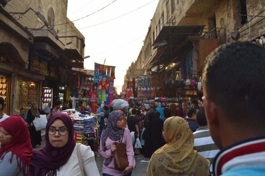 People walking through a market in Egypt